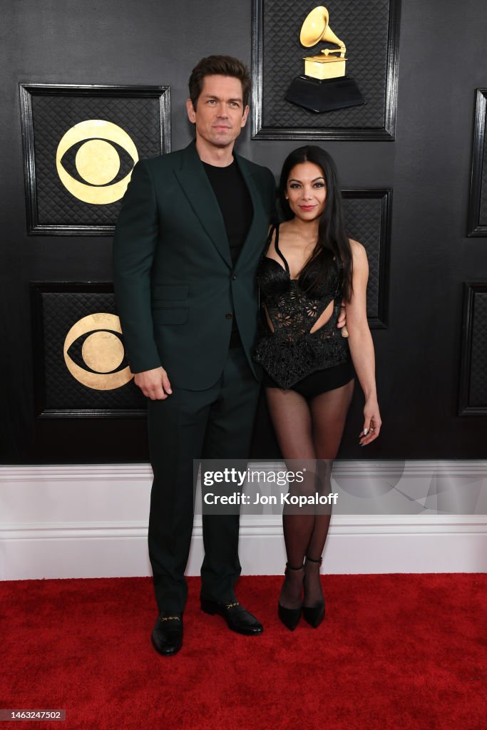Steve Howey and Ginger Gonzaga attend the 65th GRAMMY Awards on... News