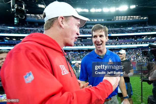 Head coach Peyton Manning and NFC head coach Eli Manning meet on the field after the 2023 NFL Pro Bowl Games at Allegiant Stadium on February 05,...