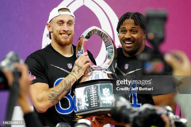 George Kittle of the San Francisco 49ers and Cam Jordan of the New Orleans Saints and NFC celebrate after defeating the AFC 35-33 during the 2023 NFL...