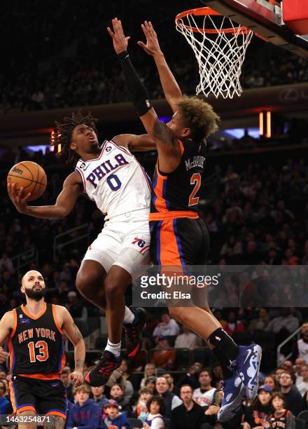 Tyrese Maxey of the Philadelphia 76ers heads for the net as Miles McBride of the New York Knicks defends in the first half at Madison Square Garden...