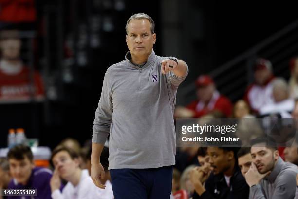 Head Coach Chris Collins of the Northwestern Wildcats calls out instruction during the first half of the game against the Wisconsin Badgers at Kohl...