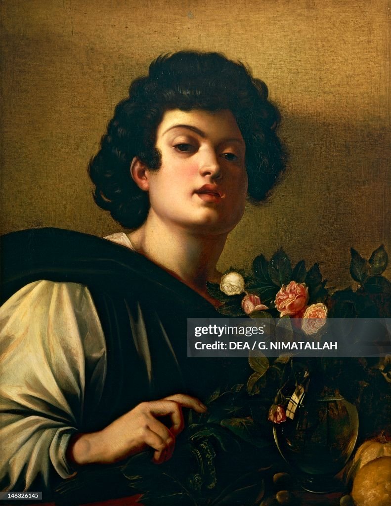Boy with a vase of roses
