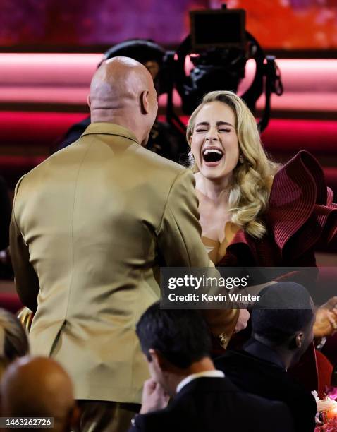 Dwayne Johnson and Adele attend the 65th GRAMMY Awards at Crypto.com Arena on February 05, 2023 in Los Angeles, California.