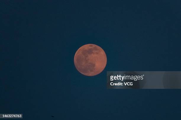 Full moon rises in the sky during the Lantern Festival on February 5, 2023 in Beijing, China. On Sunday, the full moon, also known as Snow Moon, rose...