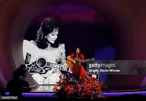 An image of the late Loretta Lynn is projected on a screen while Kacey Musgraves performs onstage during the 65th GRAMMY Awards at Crypto.com Arena...