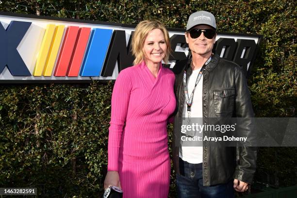 Sports NASCAR host Shannon Spake and actor Rob Lowe pose for photos on the Red Carpet prior to the NASCAR Clash at the Coliseum at Los Angeles...