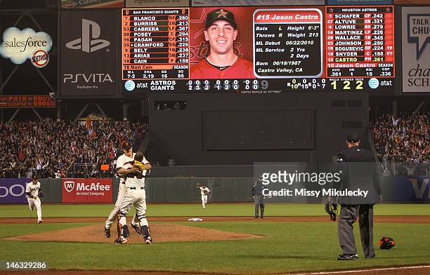 Matt Cain of the San Francisco Giants is congratulated by teammate Buster Posey after the game against the Houston Astros at AT&T Park on Wednesday,...