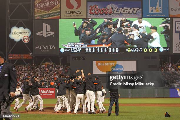 Matt Cain of the San Francisco Giants is congratulated by teammates after the game against the Houston Astros at AT&T Park on Wednesday, June 13,...