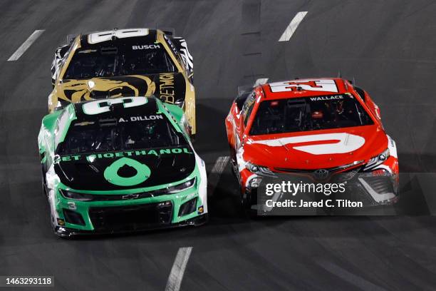 Bubba Wallace, driver of the DoorDash Toyota, Austin Dillon, driver of the Get Bioethanol Chevrolet, and Kyle Busch, driver of the BetMGM Chevrolet,...