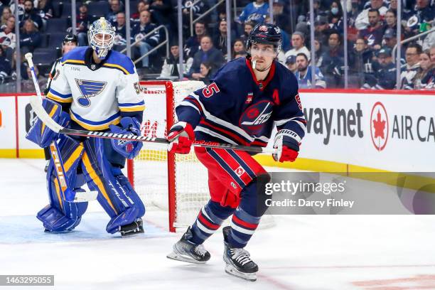 Mark Scheifele of the Winnipeg Jets keeps an eye on the play during first period action against the St. Louis Blues at the Canada Life Centre on...