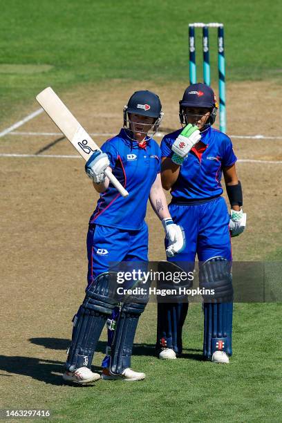 Katie Perkins of Auckland celebrates her half century during the Hallyburton Johnstone Shield match between Wellington Blaze and Auckland Hearts at...