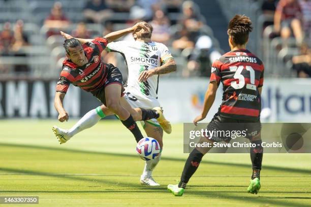 Gabriel Cleur of the Wanderers is challenged by United's Joshua Risdon during the round 15 A-League Men's match between Western Sydney Wanderers and...