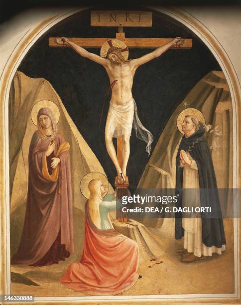 Florence, Museo Di San Marco Mary Magdalene at the feet of crucified Christ, 1437-1445, by Giovanni da Fiesole, known as Fra Angelico , fresco. Cells...