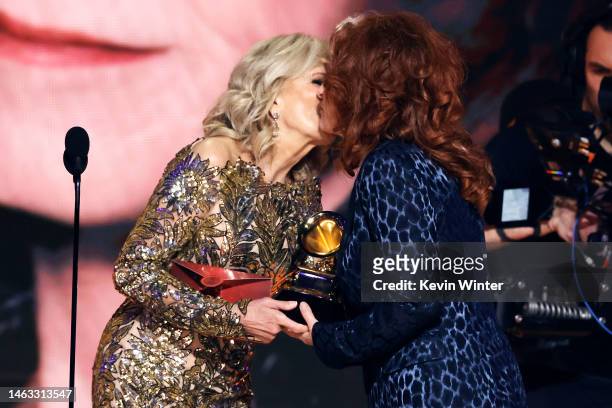 Bonnie Raitt accepts the Song of the Year award for “Just Like That” from U.S. First Lady Dr. Jill Biden onstage during the 65th GRAMMY Awards at...