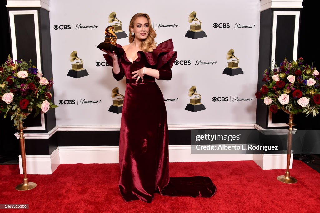 adele-poses-with-the-best-pop-solo-performance-award-for-easy-on-me-in-the-press-room-during.jpg