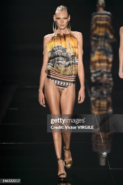 Model walks the runway during the Agua De Coco show as part of the Sao Paulo Fashion Week Spring Summer 2013 on June 13, 2012 in Sao Paulo, Brazil.