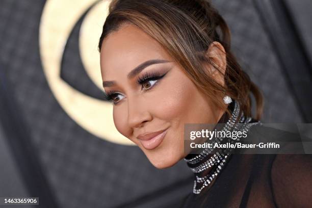 Adrienne Bailon attends the 65th GRAMMY Awards at Crypto.com Arena on February 05, 2023 in Los Angeles, California.