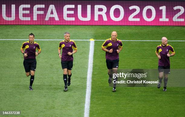 Match officials, additional assistant referee Mark Clattenburg and assistant Peter Kirkup, referee Howard Webb, assistant referee Michael Mullarkey...