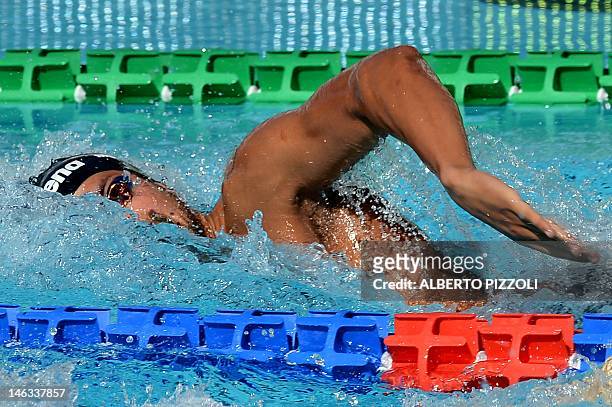Tunisian Oussama Mellouli competes during the 400mt freestyle men’s at the Settecolli trophy on June 14, 2012 at Rome’s Foro Italico. AFP PHOTO /...