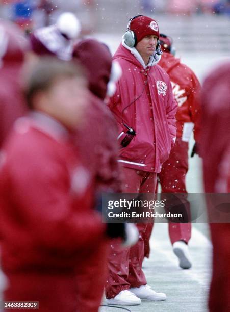 Gary Gibbs, Head Coach for the University of Oklahoma Sooners looks on from the sideline during the NCAA Big-8 Conference college football game...