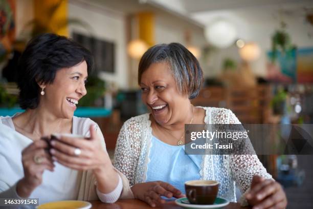 cafe, friends and senior women with coffee smile, relax and together for quality time, conversation and social chat. happy, retirement and elderly woman laughing, talking and drinking in restaurant - friends smile bildbanksfoton och bilder