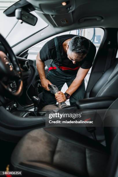 car cleaning and valeting service - cleaning inside of car stock pictures, royalty-free photos & images