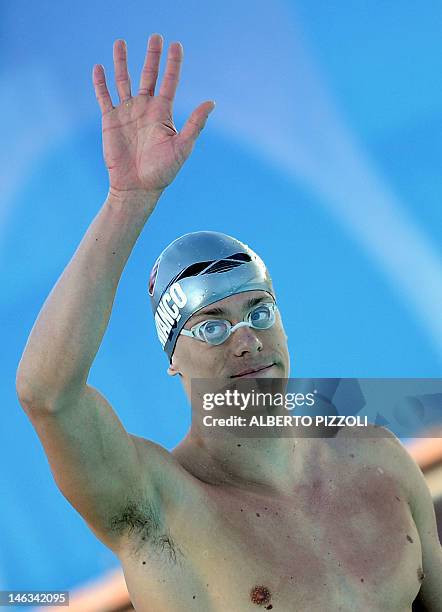 Brazilian Cesar Cielo salutes the crowd prior to the men’s 50-metre freestyle swimming event at the Settecolli trophy on June 14, 2012 at Rome’s Foro...