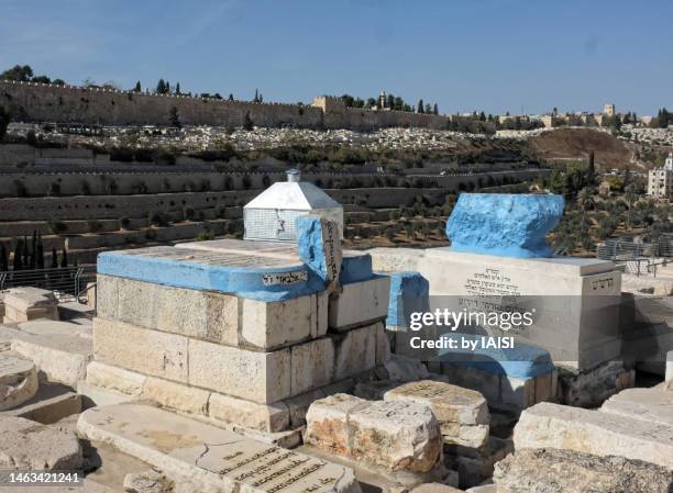 tombs of kabbalists on the mount of olives cemetery, in the background, the walls of jerusalem - kabbalah stock pictures, royalty-free photos & images