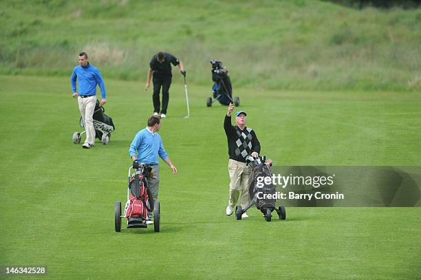 Tony Hayes throws caution to the wind watched by his playing partner Michael Dixon both of the K Clubduring the Virgin Atlantic PGA National Pro-Am...