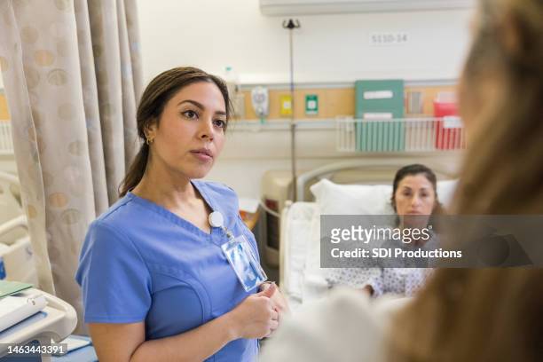 nurse listening - empathetic listening stock pictures, royalty-free photos & images
