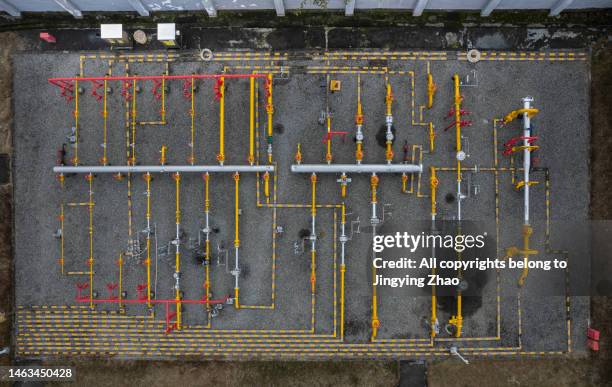 overlooking  a natural gas gathering and transmission station - execution equipment stock pictures, royalty-free photos & images