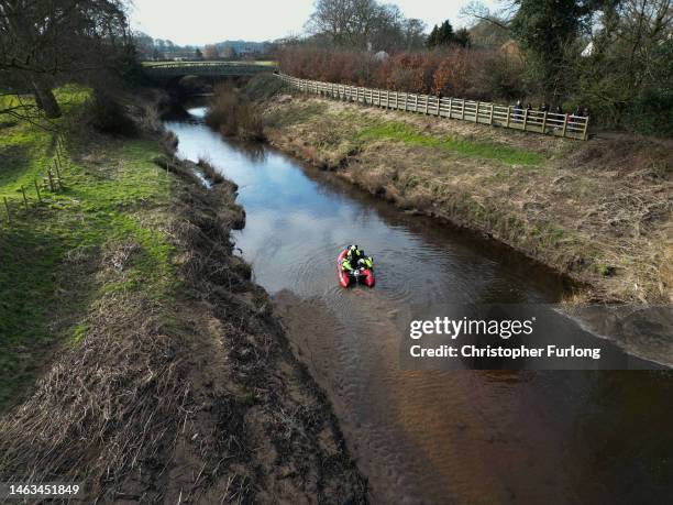 In this aerial view, search team members use sonar equipment onboard a RIB boat on February 6, 2023 in St Michael's on Wyre, England. An independent...
