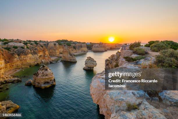 algarve coastline at sunrise, portugal - iacomino portugal 個照片及圖片檔