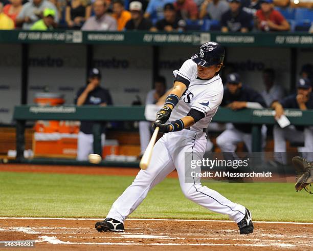 Designated hitter Hideki Matsui of the Tampa Bay Rays singles against the New York Mets June 14, 2012 at Tropicana Field in St. Petersburg, Florida.