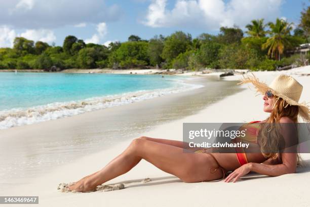 woman  on tropical beach - older woman bathing suit stock pictures, royalty-free photos & images