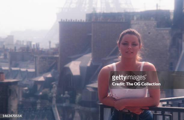 Portrait of American model and actress Sheila Kennedy as she leans on the balcony at the Four Seasons Hotel George V, Paris, France, August 1981. A...