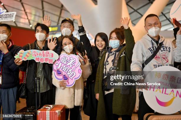 Travellers of a tour group pose at Nanning Wuxu International Airport on the way to Bangkok in Thailand on February 6, 2023 in Nanning, Guangxi...