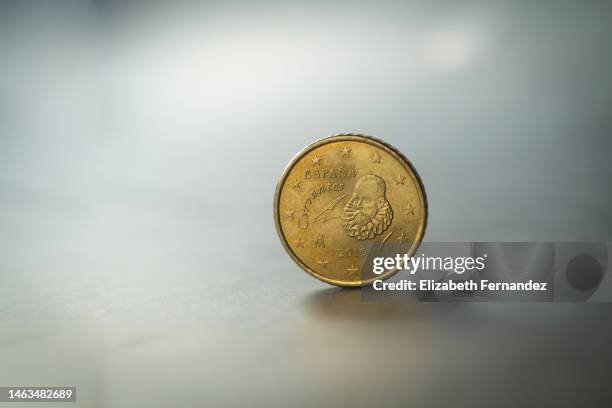 close up view of euro coin with miguel de cervantes engrave image on gray background - elizabeth cervantes stock pictures, royalty-free photos & images