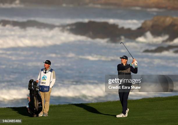 Justin Rose of England watches his shot on the 10th hole during the continuation of the final round of the AT&T Pebble Beach Pro-Am at Pebble Beach...