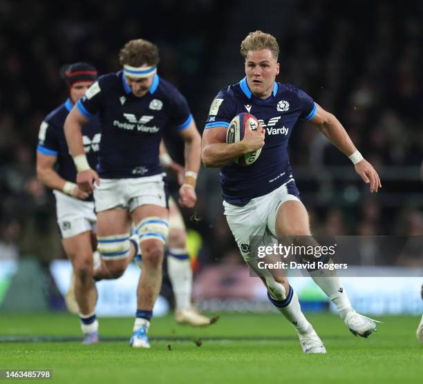 Duhan van der Merwe of Scotland breaks with the ball to score his first and Scotland's second try during the Six Nations Rugby match between England...