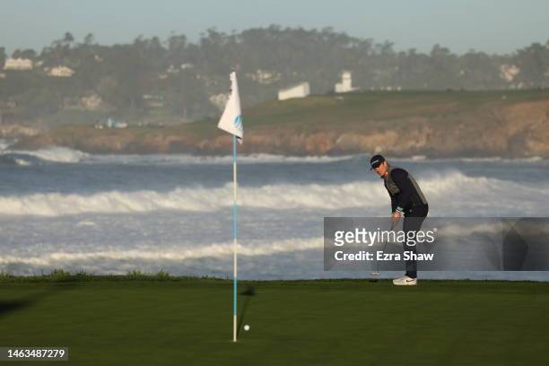 Justin Rose of England reacts to his putt on the 10th green during the continuation of the final round of the AT&T Pebble Beach Pro-Am at Pebble...