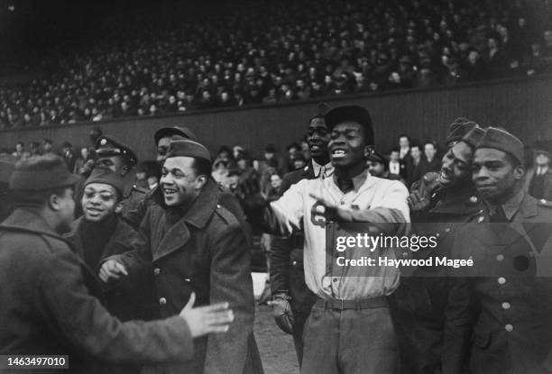 Group of uniformed US soldiers at an American Games Day at Hampden Park stadium in Glasgow, 31st October 1942. The event features exhibition...