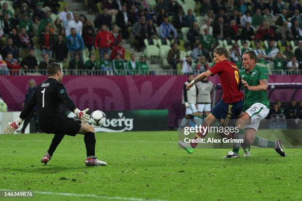 Fernando Torres of Spain scores their third goal during the UEFA EURO 2012 group C match between Spain and Ireland at The Municipal Stadium on June...