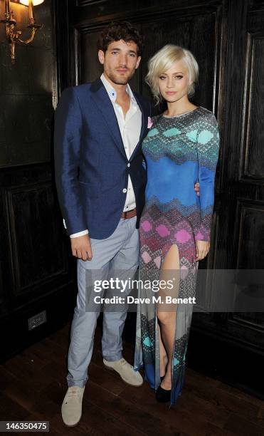 Model Max Rogers and Kimberly Wyatt attend as Tommy Hilfiger hosts a cocktail party to celebrate the launch of London Collections: Men at The Scotch...