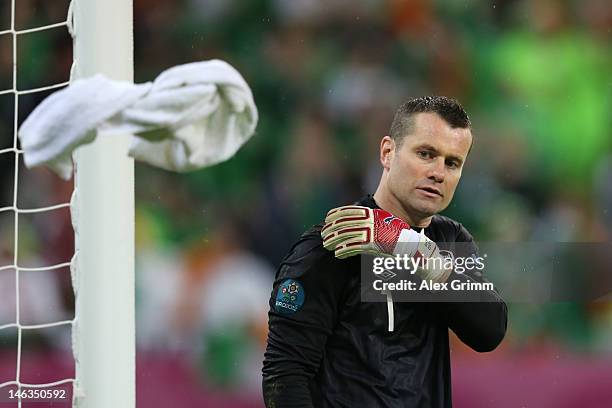 Shay Given of Republic of Ireland tosses the towel during the UEFA EURO 2012 group C match between Spain and Ireland at The Municipal Stadium on June...