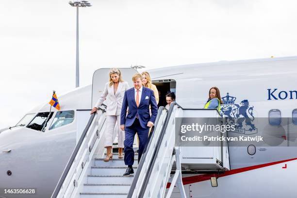 King Willem-Alexander of The Netherlands, Queen Maxima of The Netherlands and Princess Amalia of The Netherlands arrive at the airport with the...
