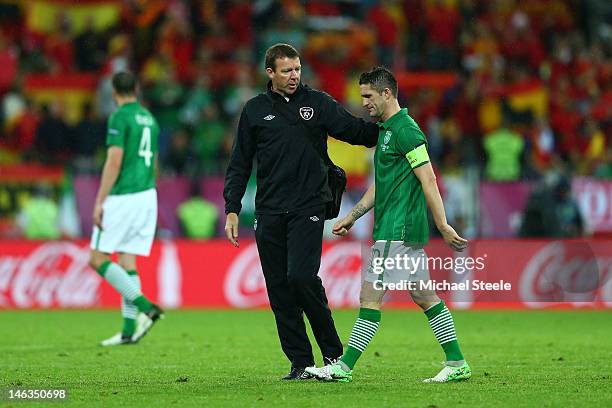 Robbie Keane of Republic of Ireland is consoled by goal Alan Kelly during the UEFA EURO 2012 group C match between Spain and Ireland at The Municipal...