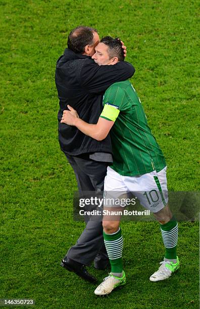 Robbie Keane of Republic of Ireland is consoled by Marco Tardelli assistant coach of Republic of Ireland during the UEFA EURO 2012 group C match...