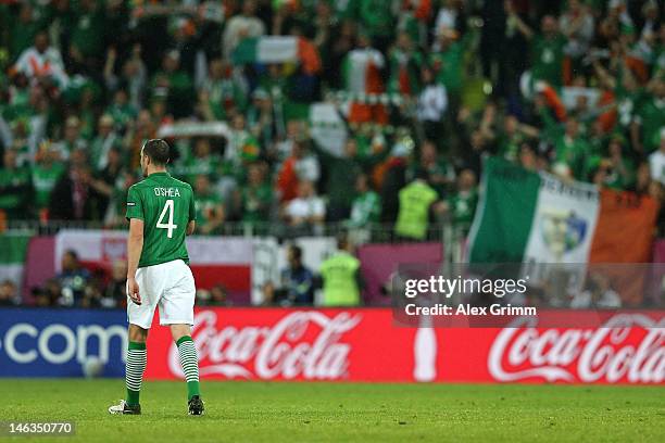 John O'Shea of Republic of Ireland at the final whistle during the UEFA EURO 2012 group C match between Spain and Ireland at The Municipal Stadium on...