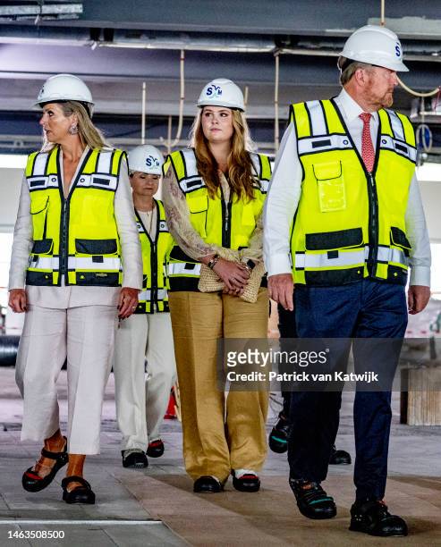 King Willem-Alexander of The Netherlands, Queen Maxima of The Netherlands and Princess Amalia of The Netherlands visit the restoration workers of SXM...